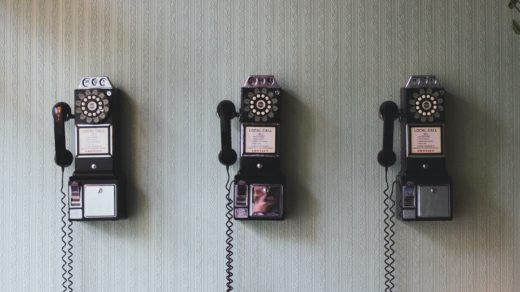minimalist photography of three crank phones